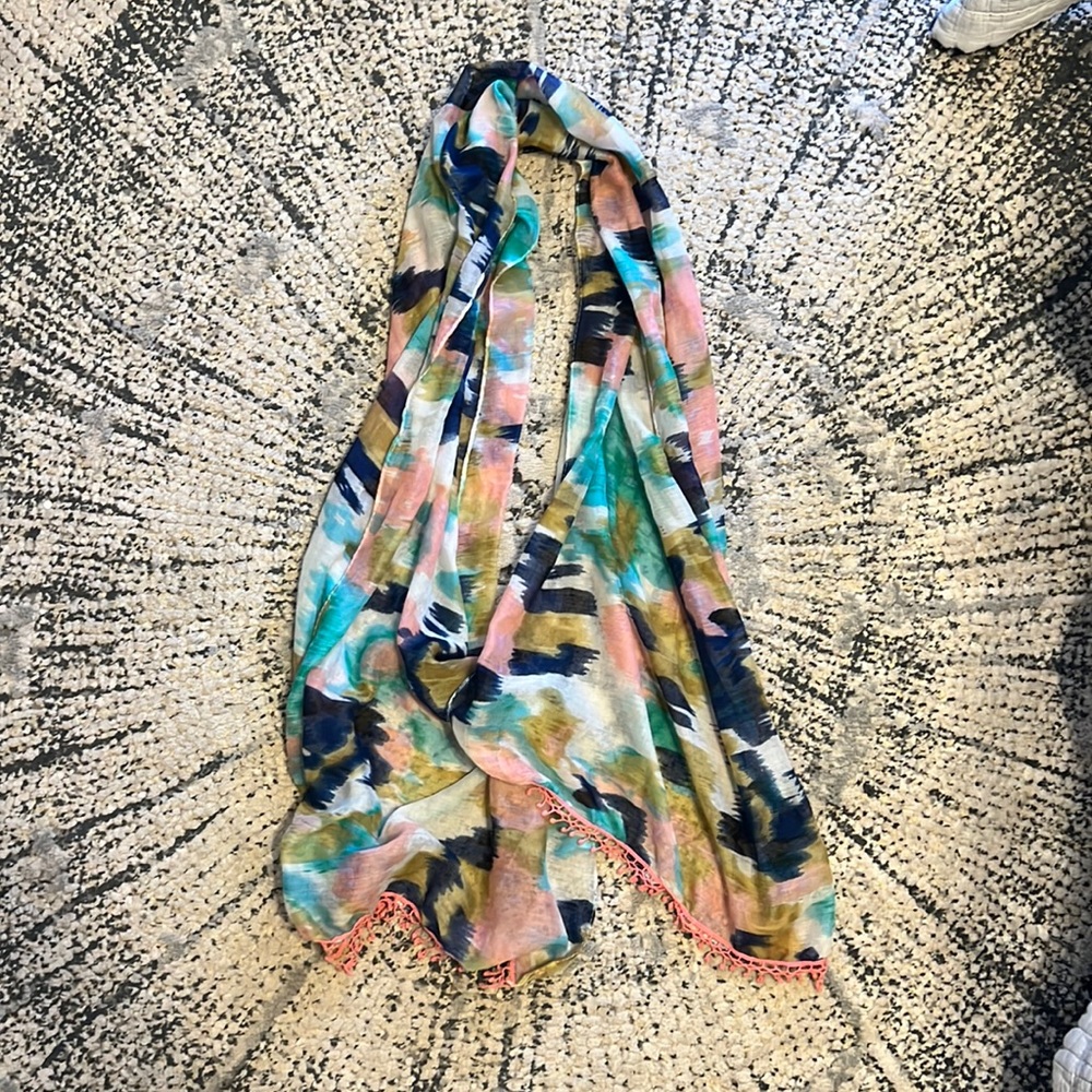 Multi-colored scarf with pink fringe. Worn once!